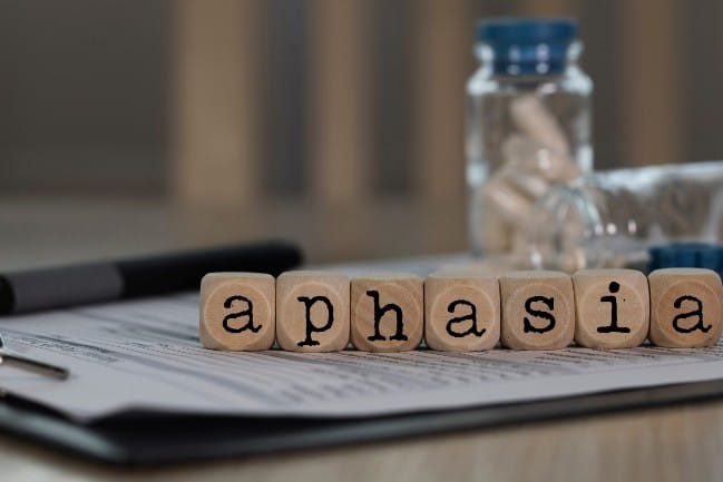 Blocks with letters that spell out "aphasia"