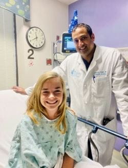 Abigail and Dr. Alman in the hospital.