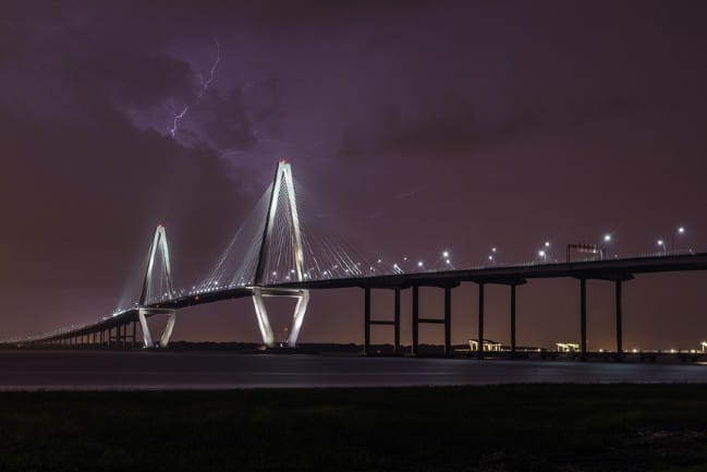 Lightning over the Ravenel Bridge at night. 